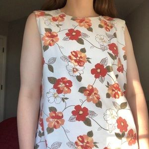 Off white/cream tank top with red orange floral design